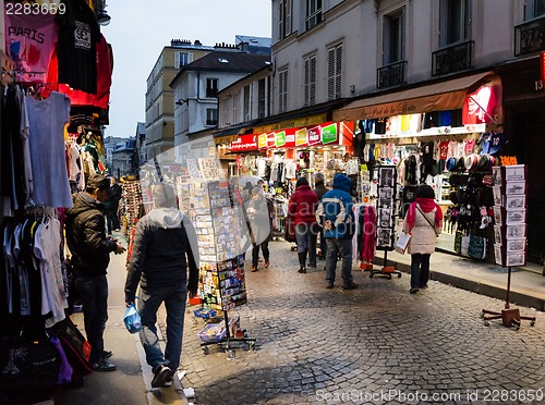 Image of Evening buzz around the souvenir shops in Paris, France