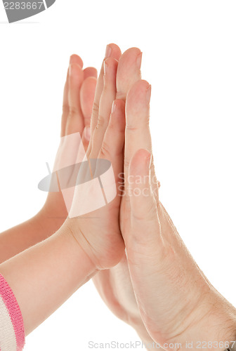 Image of Adults and children's hands