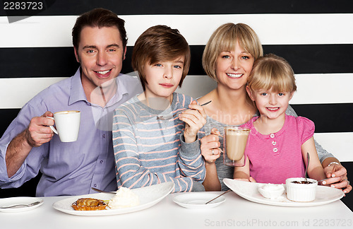 Image of Family enjoying breakfast at a restaurant