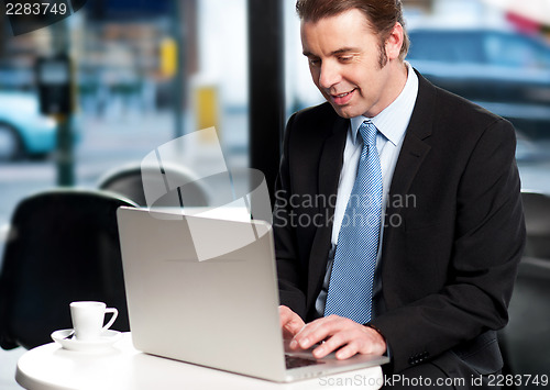 Image of Work on the move. Businessman working