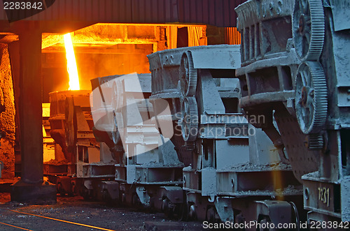 Image of steel buckets to transport the molten metal