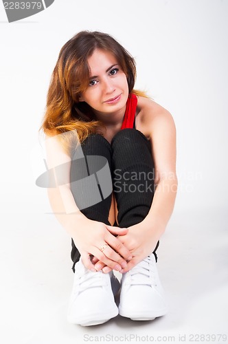 Image of young happy woman doing fitness exercise