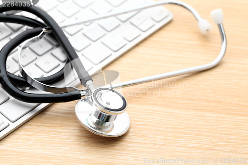 Image of Stethoscope and keyboard