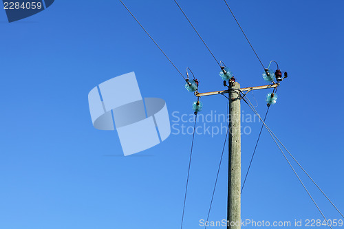 Image of Powerline on wooden pillar