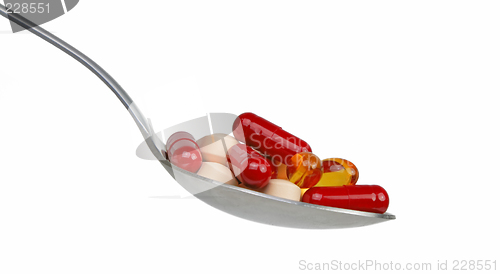 Image of Spoon with capsules