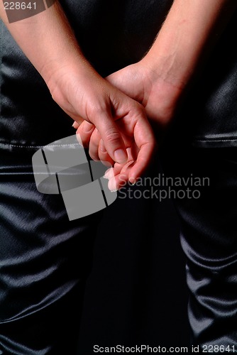 Image of hands on back