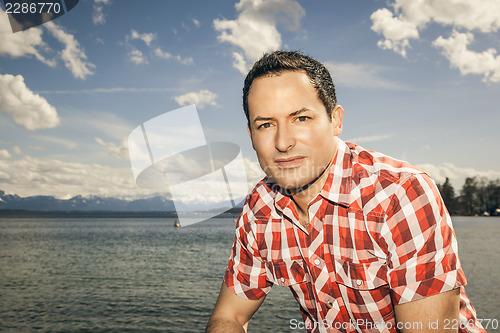Image of man at the lake