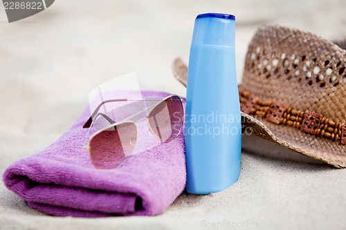 Image of sunprotection objects on the beach in holiday