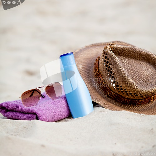 Image of sunprotection objects on the beach in holiday