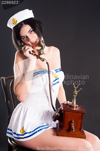Image of Young sailor talking by phone