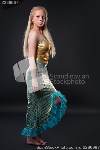 Image of Attractive girl in mermaid costume
