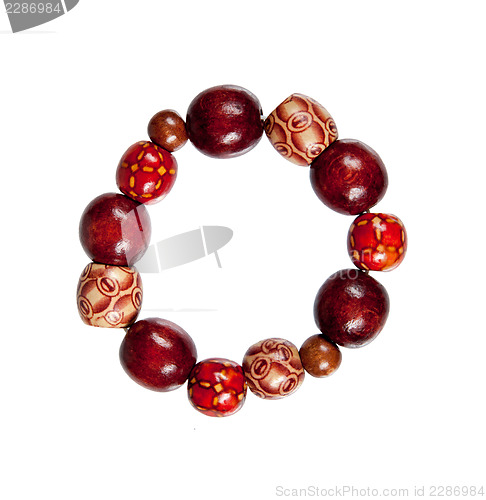 Image of bracelet made of wood red and brown