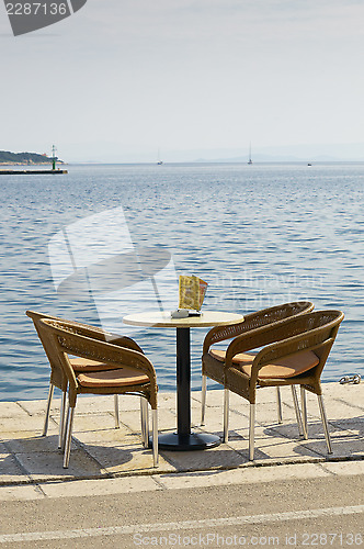 Image of Empty table and four chairs 