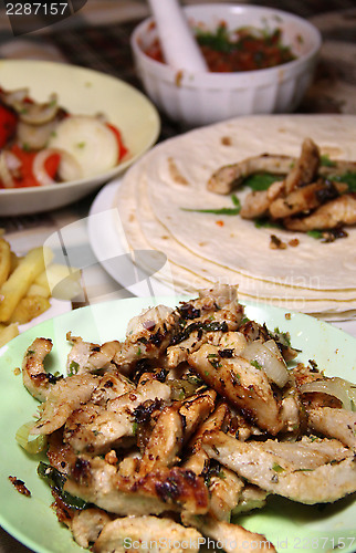 Image of Mexican food with tortillas and nachos 