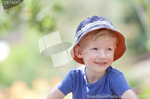 Image of adorable boy outdoors