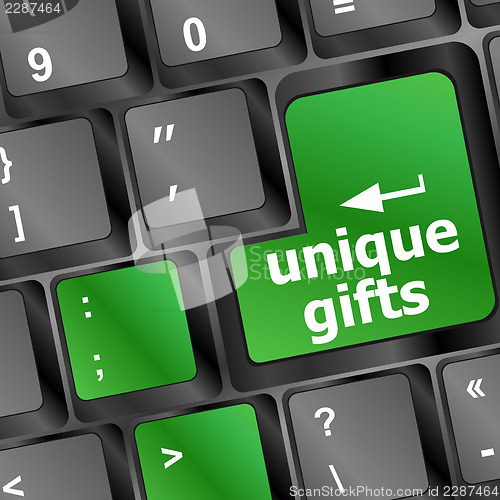 Image of unique gifts, on the keyboard - holiday concept