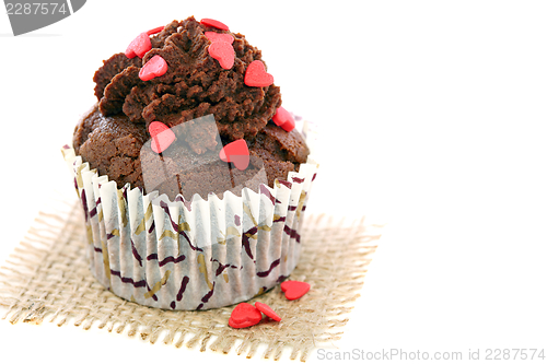 Image of Cupcake with sugar hearts.