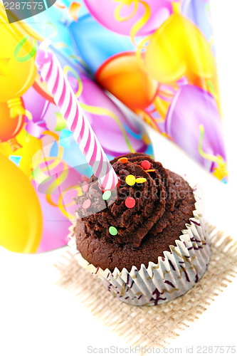 Image of Festive Cupcake and funny hats.