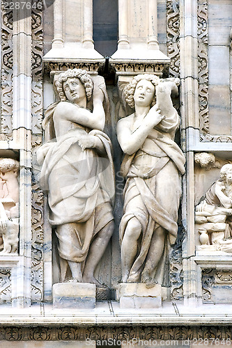 Image of  statue of a women in  front