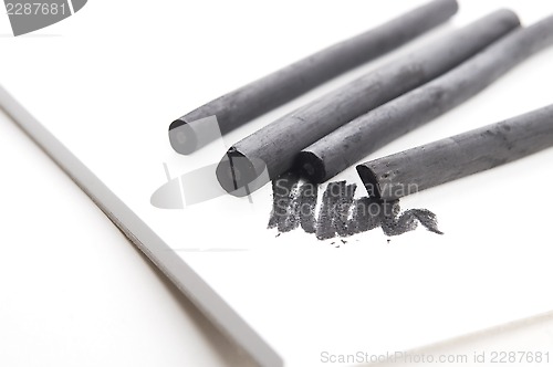 Image of Artist's black charcoal with smudge