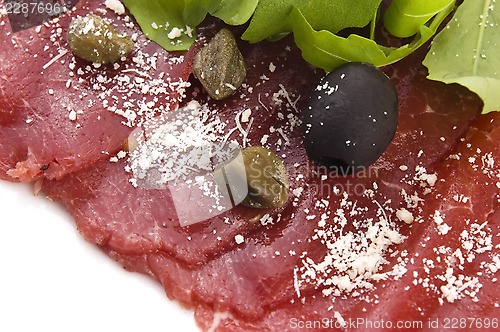 Image of Beef carpaccio with rucola and parmesan 