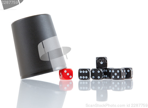 Image of Gambling background with dice and dice cup