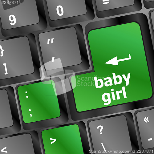 Image of Keyboard with baby girl word on computer button