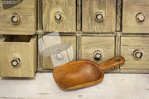 Image of empty rustic wooden scoop