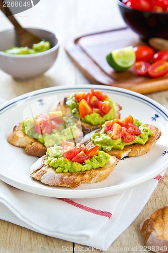 Image of Crostini with avocado and tomato