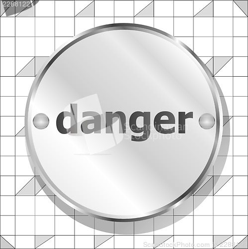 Image of danger word on metallic button