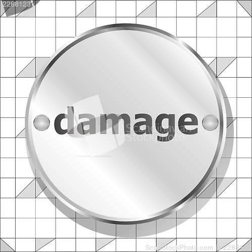 Image of damage word on metallic button