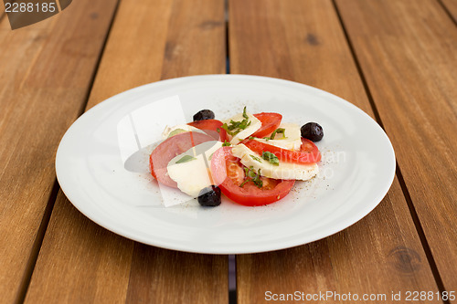 Image of Fresh mozzarella, tomatoes salad