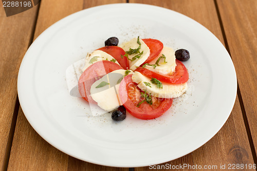 Image of Delicious mozzarella, tomatoes salad