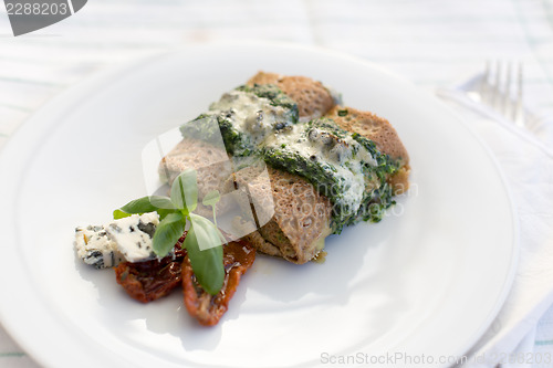 Image of Delicious salty pancakes with spinach