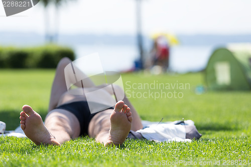 Image of Man feet on grass