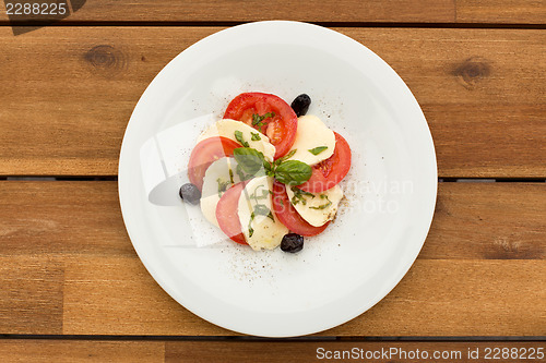 Image of Tomatoes and mozzarella salad