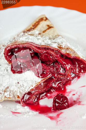 Image of pancakes with cherries