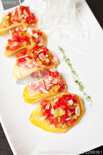 Image of potato chips with vegetables