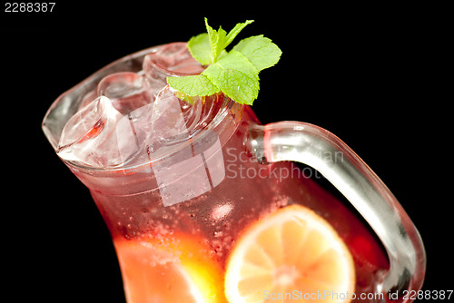 Image of Fresh lemonade from lemon and berries closeup