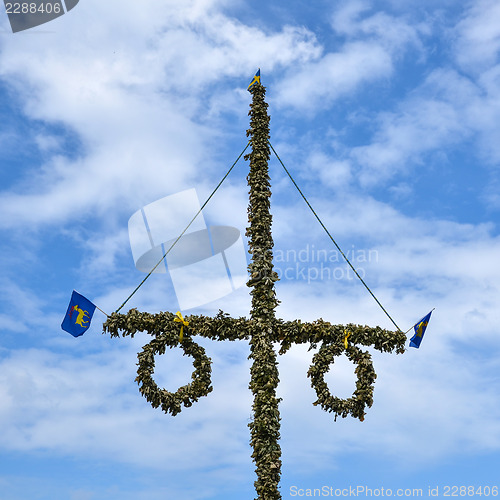 Image of May pole with provincial flag