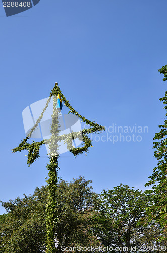 Image of Midsummer pole at blue sky