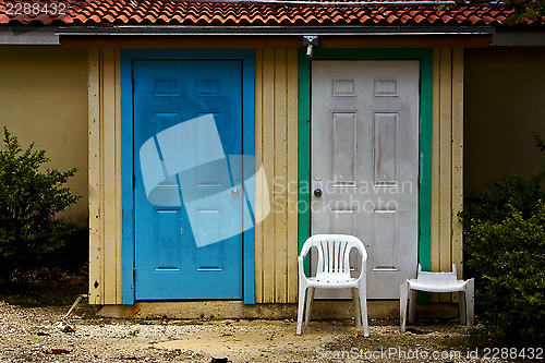 Image of door and broke plastic  