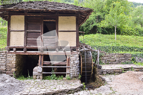 Image of Water mill and water wheel, called "Dolap", which puts water in 