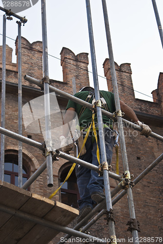 Image of construction worker on scaffold