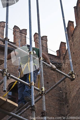 Image of construction worker on scaffold