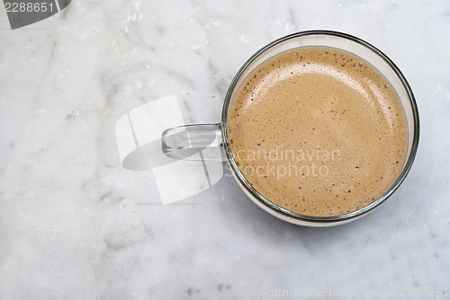 Image of cup of italian coffee isolated on marble