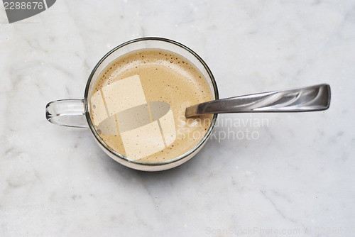 Image of cup of italian coffee isolated on marble