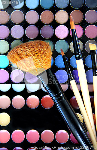 Image of Makeup palette and brushes