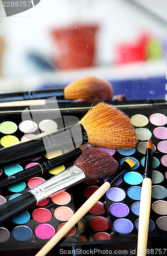 Image of Makeup palette and brushes