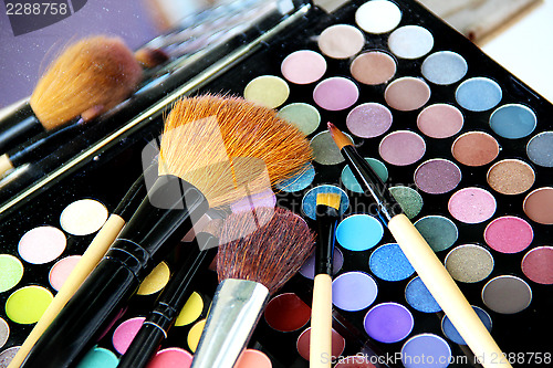 Image of Makeup palette and brushes